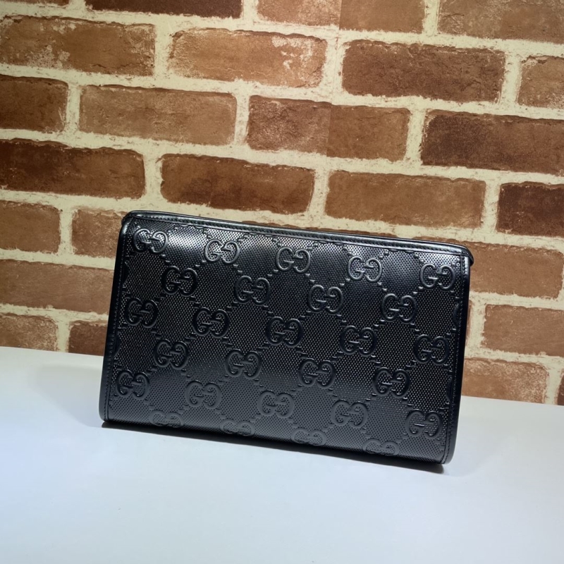 G*u*i clutch bags
